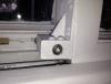 Old sash window lock with triangular key.JPG